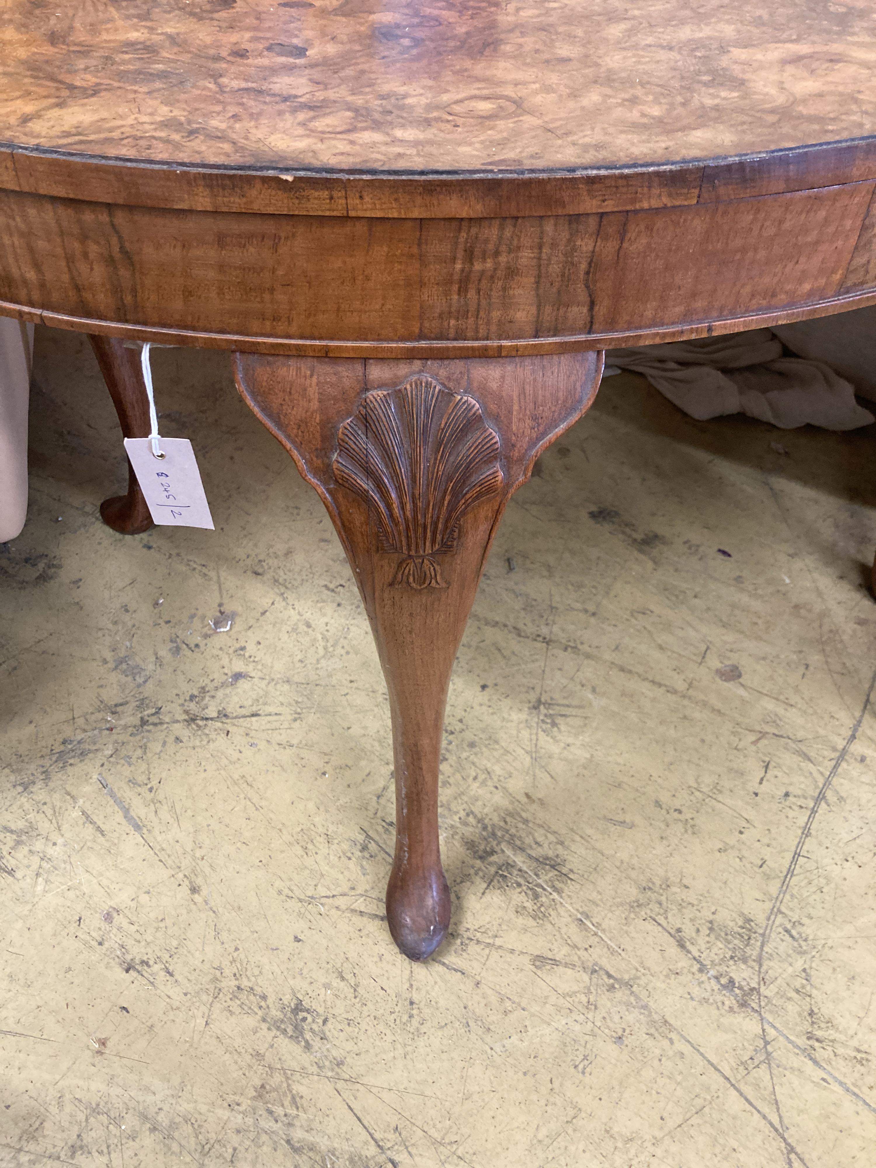 A Queen Anne revival oval walnut centre table, width 118cm, depth 88cm, height 72cm